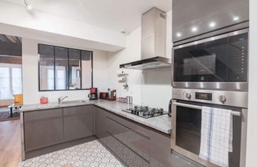 Tournus House | Townhouse with covered interior courtyard