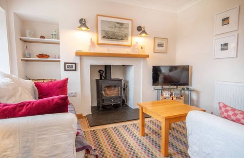 Golspie Cottage | Traditional Highland semi-detached old stone cottage