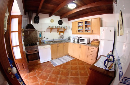 Estreito da Calheta Cottage | Traditional house. Fantastic sea view. Large outdoor spaces with barbecue.