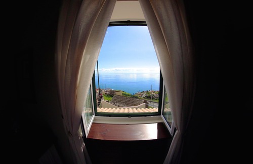Estreito da Calheta Cottage | Traditional house. Fantastic sea view. Large outdoor spaces with barbecue.