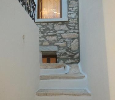 Aperathos House | Traditional stone house with panoramic mountain view