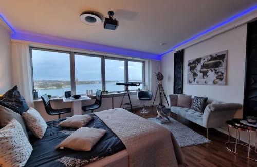 Schleswig Apartment | Traumblick! Mitten im Wasser, den Wolken ganz nah!