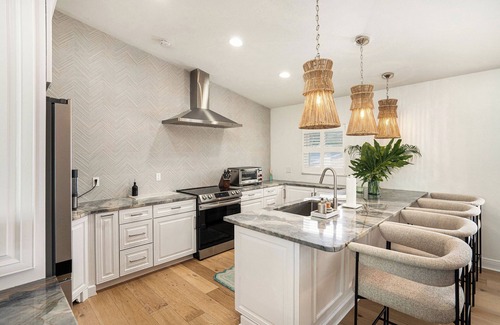 Capri Isle House | TREASURE ISLAND FLORIDA- Discover your luxury 4 bedroom home on canal fishing