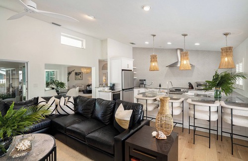 Capri Isle House | TREASURE ISLAND FLORIDA- Discover your luxury 4 bedroom home on canal fishing