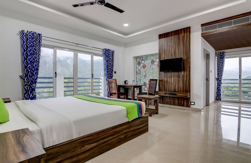 Kannan Devan Hills Hotel | Treebo Premium Misty Garden Resorts