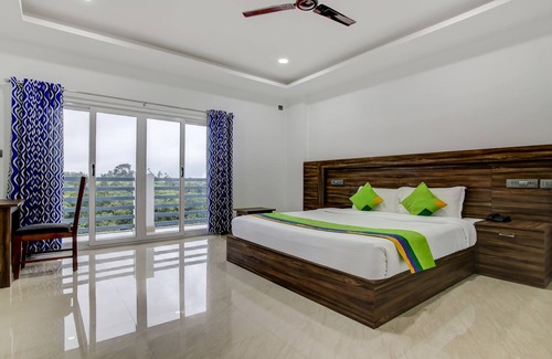 Kannan Devan Hills Hotel | Treebo Premium Misty Garden Resorts