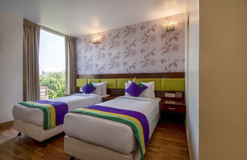 New Friends Colony Hotel | Treebo Premium Rose Mallow
