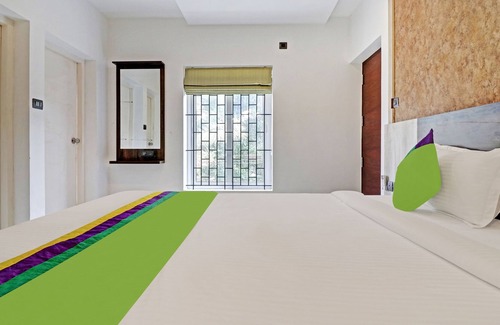 Guruvayur Hotel | Treebo Sreepathi Mayoogha