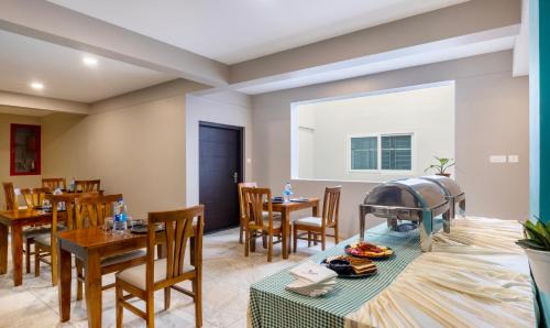 Guruvayur Hotel | Treebo Sreepathi Prayag,Guruvayur Temple