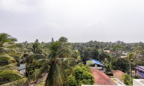 Guruvayur Hotel | Treebo Sreepathi Prayag,Guruvayur Temple