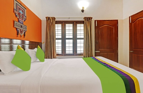 Kovalam Hotel | Treebo Trend Green Palm Resorts