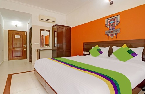 Kovalam Hotel | Treebo Trend Green Palm Resorts