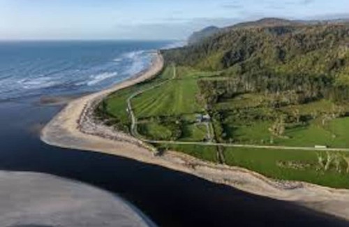 Mokihinui RV Rental | Treehouse at Cowshed cafe, Gentle Annie Camping Ground