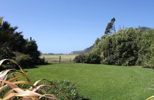 Mokihinui RV Rental | Treehouse at Cowshed cafe, Gentle Annie Camping Ground