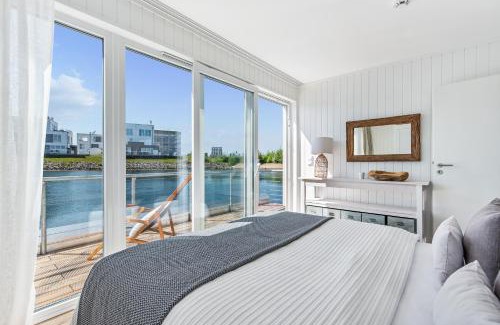 Olpenitz House | Treibholz: Meerblick, Dachterrasse, Bootsanleger, Badeleiter, Sauna