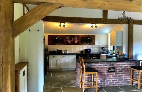 Launceston House | Trelaske Mill Cider Barn-with Hot Tub, Fire Pit BBQ