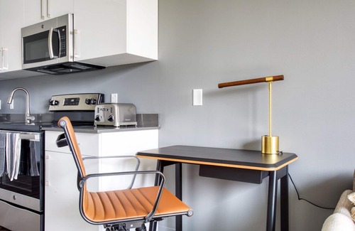 St. Elizabeth's Apartment | Trendy Brighton 1BR w/W/D, Gym, near T, Shops + Dining, by Blueground