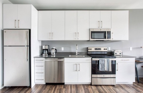 St. Elizabeth's Apartment | Trendy Brighton 1BR w/W/D, Gym, near T, Shops + Dining, by Blueground