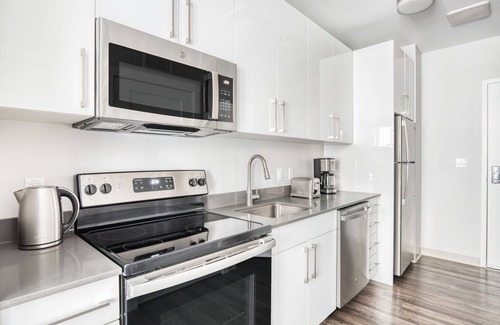St. Elizabeth's Apartment | Trendy Brighton Studio w/W/D, Gym, near T, Shops + Dining, by Blueground