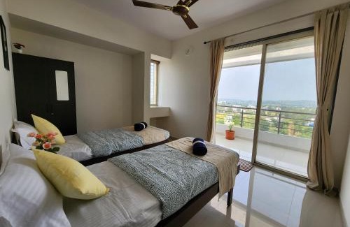 Nashik Apartment | Trinity Stays Nashik - Mountain view apartment close to Sula