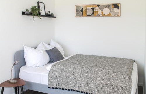 Rauental Apartment | Tropical Apartment - für Freunde & Familien, stadtnah, Parkplatz, E-Ladestation, Gitterbox für Fahrräder, Fitnessstudio, digitale Gästemappe mit Restaurant- und Unternehmenstipps