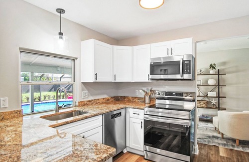 Port Saint Lucie House | Tropical Family Escape with Pool, Arcade Games and Outdoor Lounge