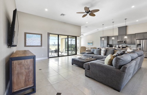 Cape Haze House | Tropical Tee Party - Find Luxury for 90 days to 6 months. Perfect - Pool, Golf, Boating & Beaches!