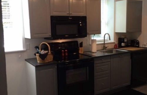 Governor's Walk House | Turn-Key Furnished Mid-Town Pool Side Bungalow