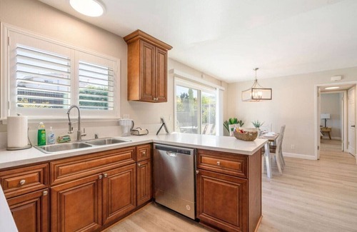 Rowland Heights House | Twilight Paradise: 4 Bedrooms, 2 Bathrooms, Private Pool, Patio Dining for 8, BBQ, and a One-of-a-Kind Indoor Fireplace.