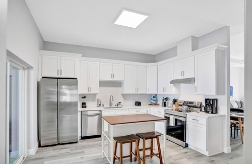 Palm Coast House | Twin villas with private pools, furnished lanais, & all-new interiors