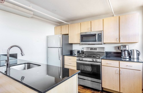 South End House | Two-level South End Loft w/Pool, Art Gallery, Steps to T by Blueground