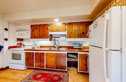 Waitsfield Condo | Two-story, creekside condo with great deck, pool & tennis - near Mad River Glen