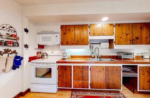 Waitsfield Condo | Two-story, creekside condo with great deck, pool & tennis - near Mad River Glen