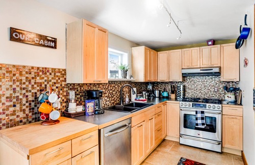 Girdwood House | Two-story, dog-friendly retreat with deck, fireplace, W/D, & mountain view