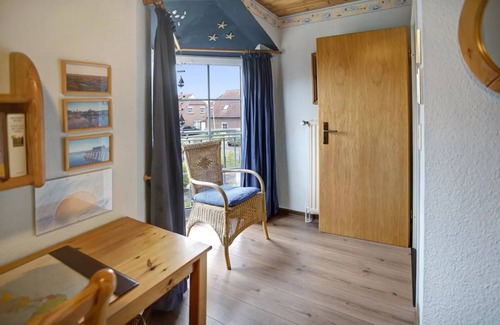 Neßmersiel House | Typical East Frisian semi-detached house, the house "Wattenmeer" High-quality, comfortably furnished semi-detached house