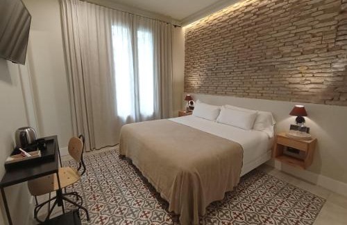 Museo Hotel | Uma Suites Parada del Marqués