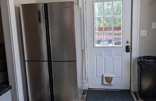 The Gate Apartment | Unique Condo in Historic Building with Rooftop Deck.