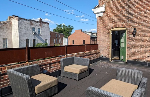 The Gate Apartment | Unique Condo in Historic Building with Rooftop Deck.