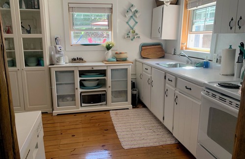 Saugeen Shores Cottage | Unique Log Cabin in Port Elgin, ON, 30 second walk to sandy beach with HOT TUB!