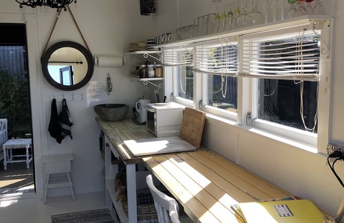 Whitianga Cottage | Unique Tiny homes with fabulous views and cosy internal courtyard.