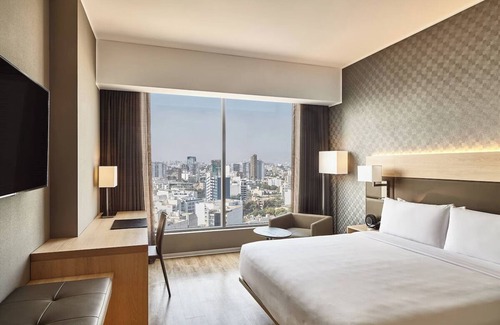 Armendariz Hotel | Unwind in Style with Rooftop Dining | Free Parking and Breathtaking Views