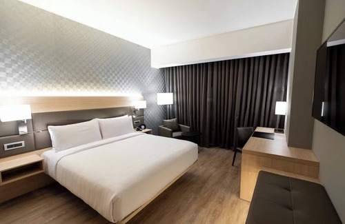 Armendariz Hotel | Unwind in Style with Rooftop Dining | Free Parking and Breathtaking Views