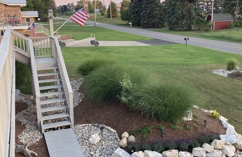 Ludington House | Upper level rental with large family room and huge wrap around deck full kitchen