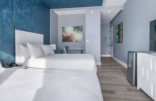 Mott Haven House | Upscale Double Queen Suite | Mott Haven | Fitness Center | Free WiFi