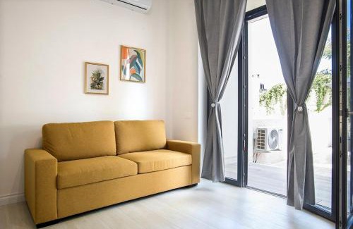 San Lorenzo Apartment | Urban Oasis near Termini, free Parking&Patio, int3