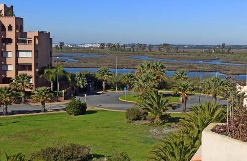 Punta del Moral Apartment | Urbanización Jardines de Isla Canela, 3º Planta.
