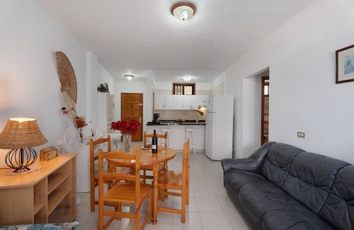 Santiago del Teide Apartment | Vacation Apartment 'Carpediem Playa La Arena' with Sea View, Shared Pool and Wi-Fi