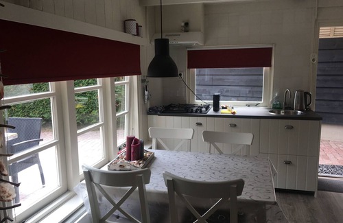 Zoutelande Cottage | Vacation at the foot of the dunes in atmospheric apartment with garden and parking.