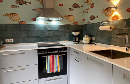 Presen House | Vacation home close to the beach with wood-burning stove, terrace