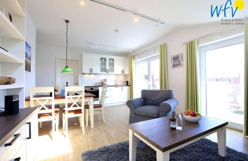 Wangerooge Apartment | Vacation with a sunny balcony and your own beach chair on the beach
